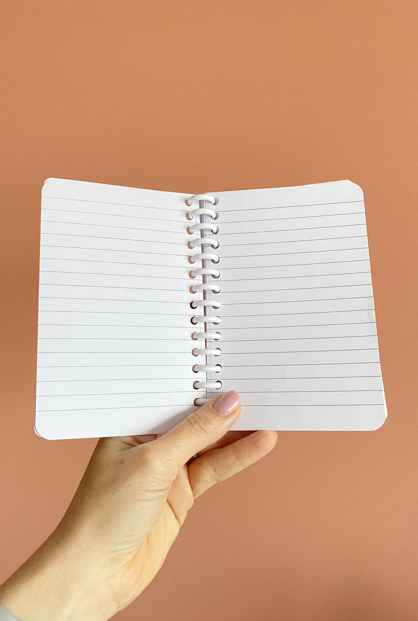 Petit carnet de notes orange et rose brillant