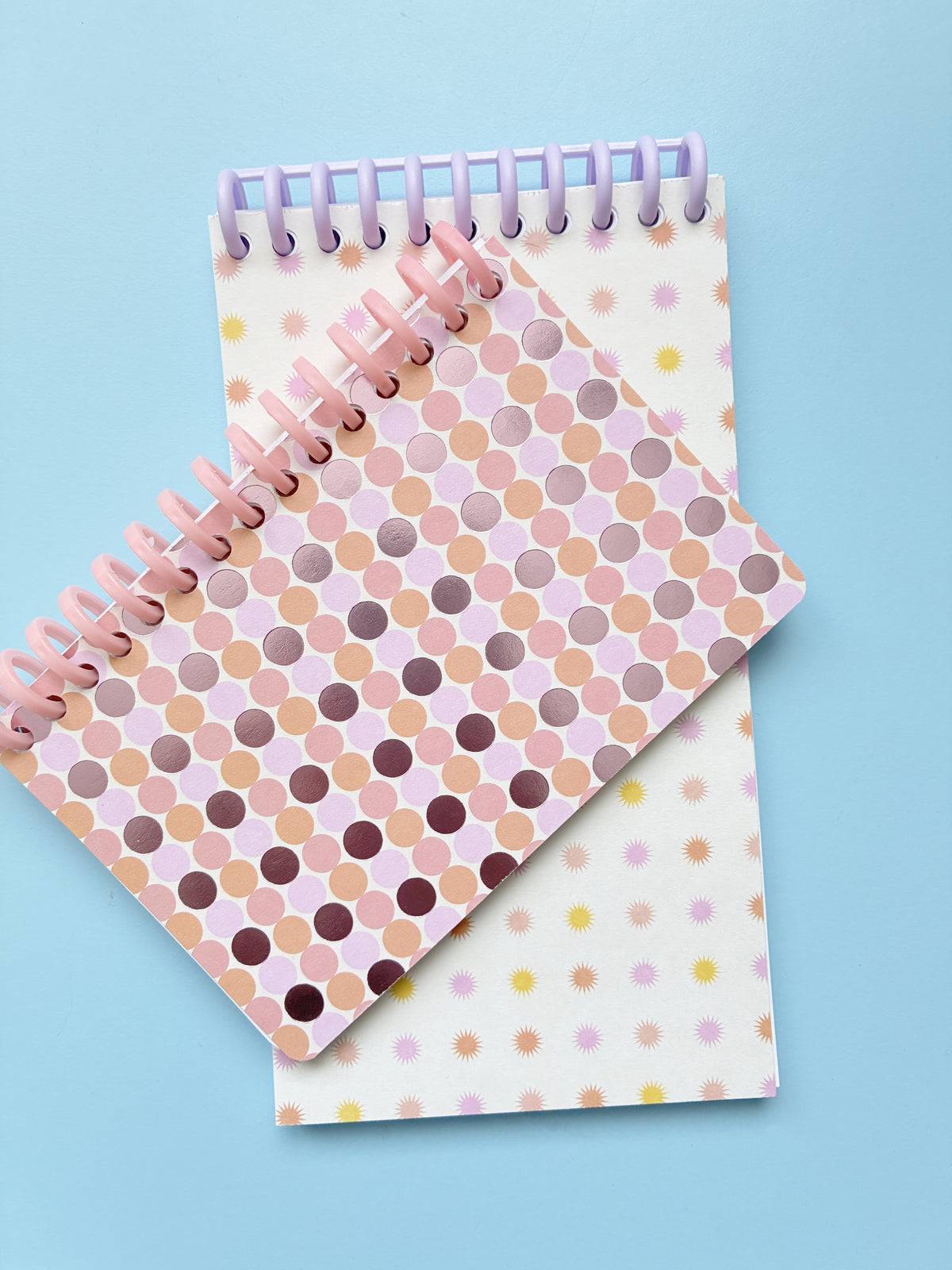 Lot de deux carnets rose et orange